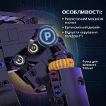 Деталізований огляд особливостей конструктора ігрового керма: реалістичний механізм кнопок, ручка для великого пальця та ергономічний дизайн у стилі боліда F1