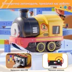 Інфографіка жовтого електричного вагончика для магнітного потяга українською мовою: опис тривалого часу роботи, демонстрація заряджання через USB та кнопки перемикача живлення