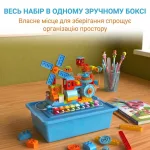 Зручний пластиковий бокс для зберігання деталей інтерактивного STEM-конструктора з музичними модулями на дитячому робочому столі