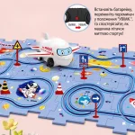 Інструкція із запуску літачка на трасі трек-пазла Космічний мандрівник: демонстрація перемикача живлення та руху коліями